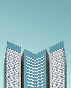 aerial photography of blue and gray buildings thumbnail