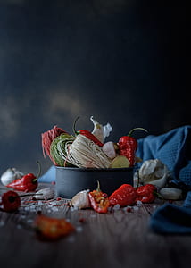 closeup photo of chilies and garlic in bowl thumbnail