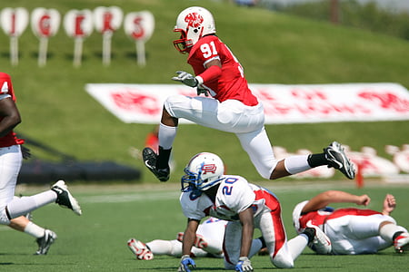 NFL player jumping during the game thumbnail