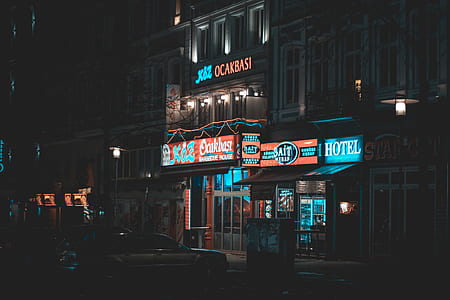 lighted hotel signage at night thumbnail