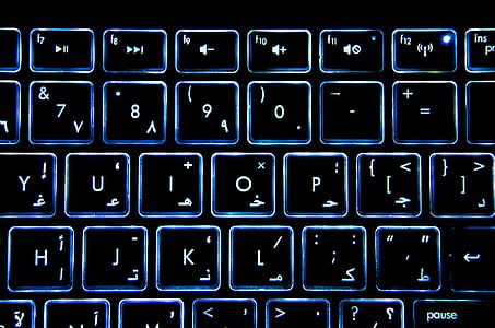 LED computer keyboard illustration on black surface thumbnail
