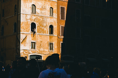 person sitting on window thumbnail