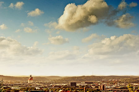 landscape photo village under blue sky thumbnail