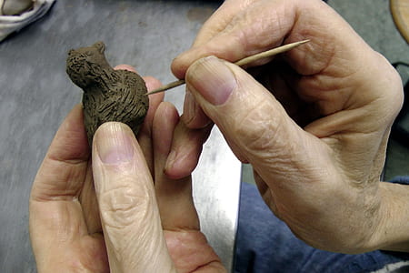 person's holding toothpick thumbnail