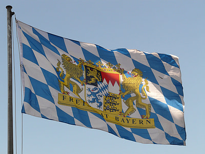 close-up photography of blue and white flag raised thumbnail