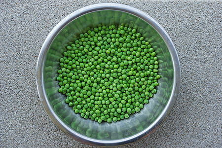 green peas in round gray stainless steel bowl thumbnail