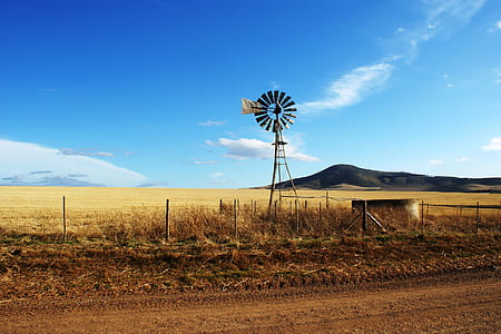 Brown and Black Wooden Wind Mill thumbnail