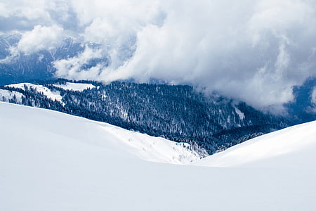 close-up photography of mountain covered by snow thumbnail