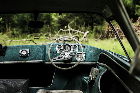 gray car steering wheel in shallow focus photography thumbnail