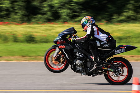 man riding sports bike thumbnail