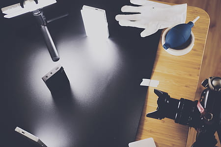 Black Dslr Camera on Top of Brown Wooden Table thumbnail
