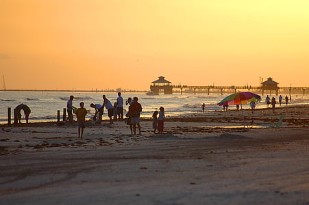 people gathered near shore thumbnail