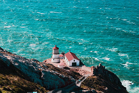 aerial photography of house near sea thumbnail