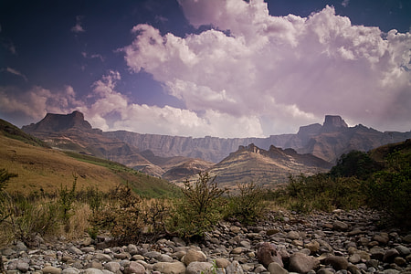 landscape photography of mountain under blue sky thumbnail