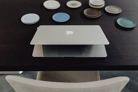 Stylish workspace with MacBook computer on home or studio thumbnail