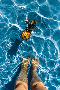 Pineapple in a swimming pool thumbnail