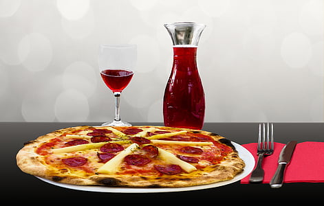 pizza on plate with wine glass thumbnail