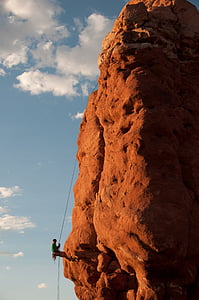 rock climber climbing on boulder thumbnail