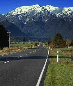 gray round beside mountain during daytime thumbnail