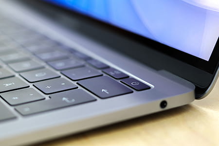 gray laptop computer turned on thumbnail