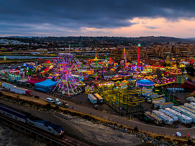 aerial view carnival under gray sky during nighttime thumbnail