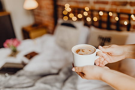 Morning coffee in bed. Working in bed thumbnail