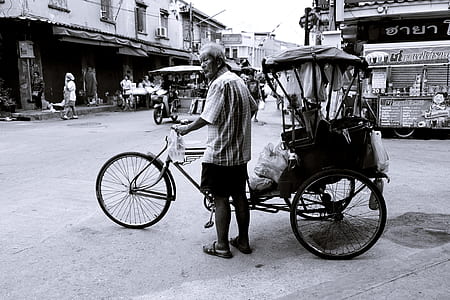 man beside trike thumbnail