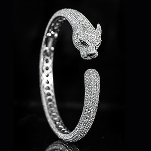 close-up photography of silver-colored cuff bracelet thumbnail
