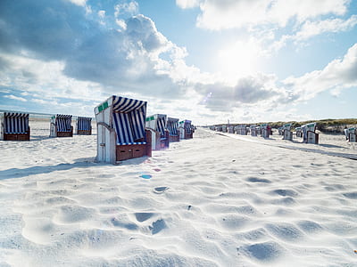blue and white stalls during daytime thumbnail