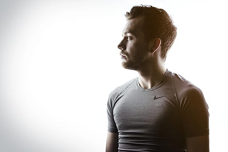 photograph of man wearing gray Nike crew-neck t-shirt thumbnail