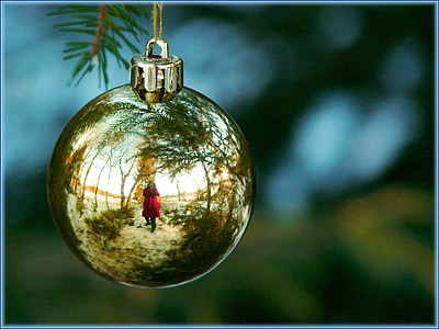 person's reflection on bauble thumbnail