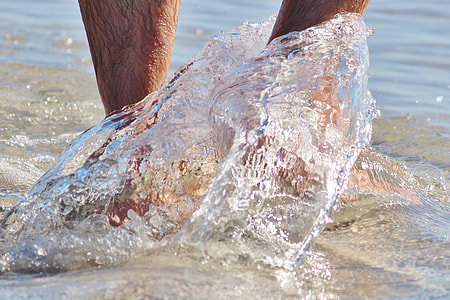 person walking on the beach thumbnail