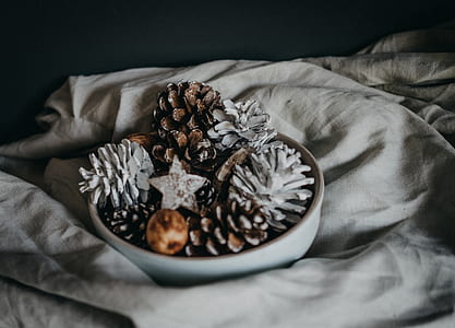 brown and white decor in white ceramic bowl thumbnail