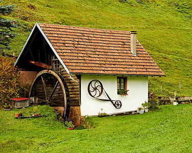 white and brown house on slope ground thumbnail