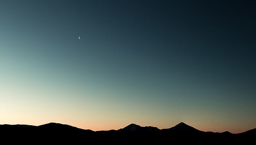 panaromic photography of mountains and sky thumbnail