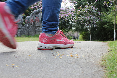 person walking on concrete road thumbnail