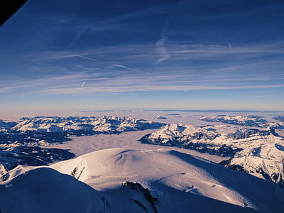 birds eye view of coated snow mountain thumbnail