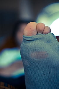 person wearing gray sock thumbnail