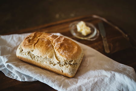 baked bread on white textile thumbnail