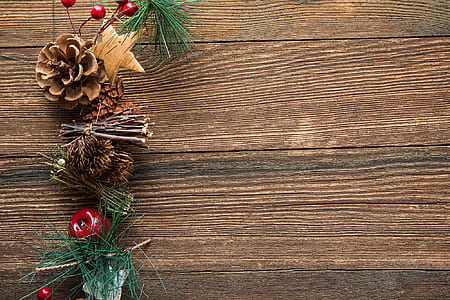 green and brown wreath on brown wooden surface thumbnail