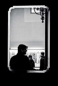 grayscale photo of man wearing sunglasses thumbnail