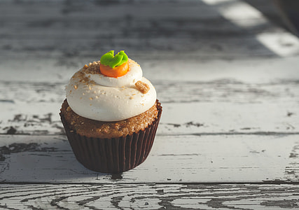 cupcake on white wooden board thumbnail
