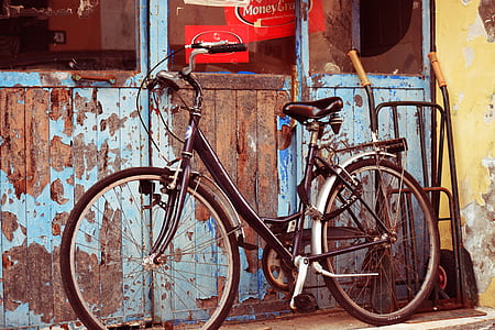 brown step-through bicycle near wall thumbnail