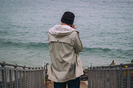 person taking photo of another person thumbnail