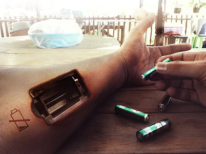 person holding battery thumbnail