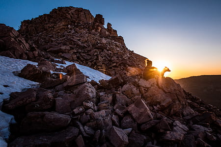 sun rays through rocky mountain thumbnail