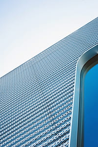 low-angle photo of gray metal building thumbnail