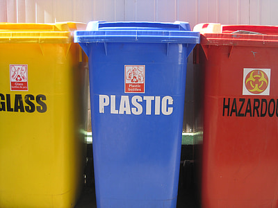 three assorted-color trash bins thumbnail