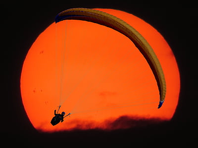person in parachute with full moon background illustration thumbnail