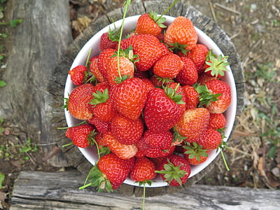 strawberries on white bowl thumbnail